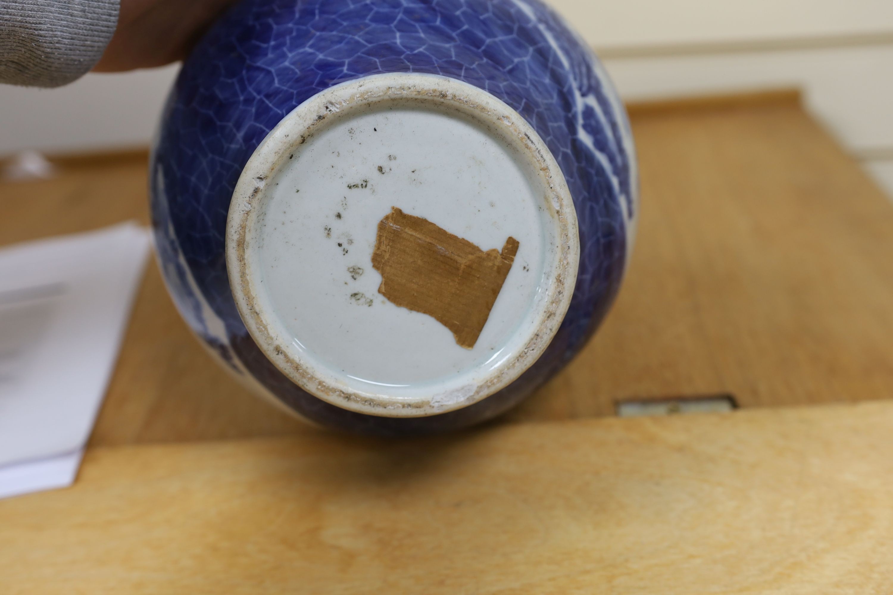 A Chinese blue and white gourd vase with landscape decoration, a similar blue and white sleeve vase and a Japanese Kutani vase